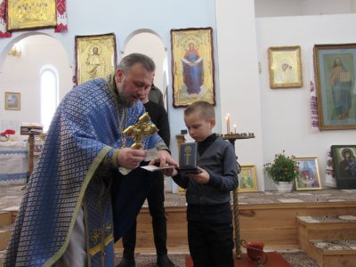 На Житомирщині сім’ї захисників отримали медалі Православної церкви України  