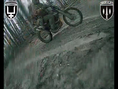 Три в одному — дрон на лісовій дорозі уразив парочку окупантів на мотоциклі  