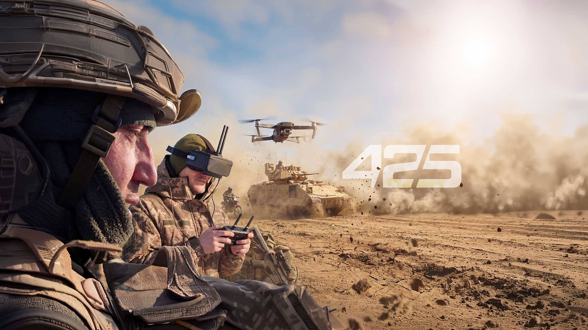 На передньому плані двоє військових у спорядженні керують дроном, один із них використовує FPV-окуляри, уважно стежачи за польотом. На задньому плані бронетехніка рухається крізь пил і дим, створюючи динамічну бойову сцену з позначкою «425».