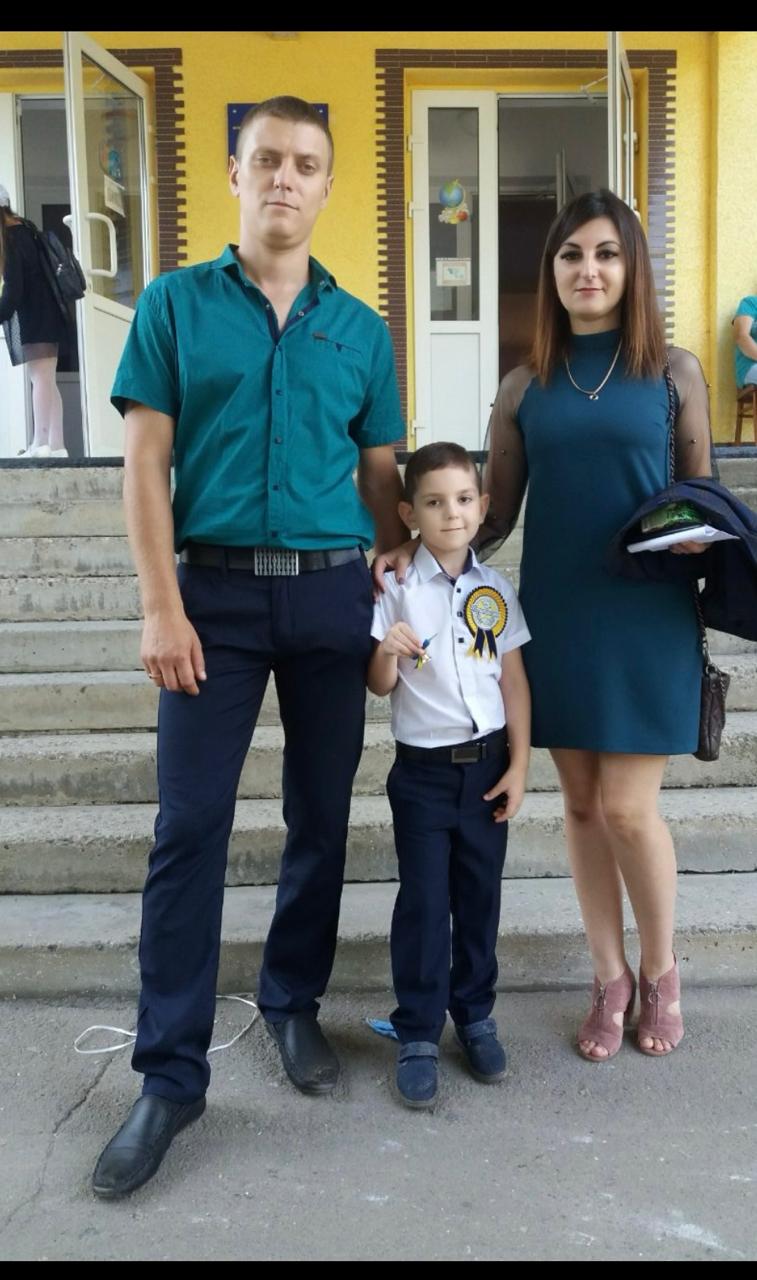 Олександра Кушарев з дружиною та сином